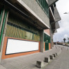 Lavada y pintada, así se ve la fachada del estadio Palogrande. El cuadro blanco es para que los grupos urbanos de Manizales pinten allí sus grafitis.