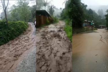 Salida del colegio por la vía convertida en un río, en zona rural de Caldas