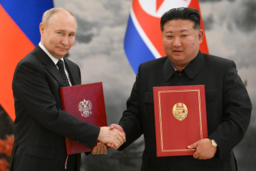 Vladímir Putin y Kim Jong-un