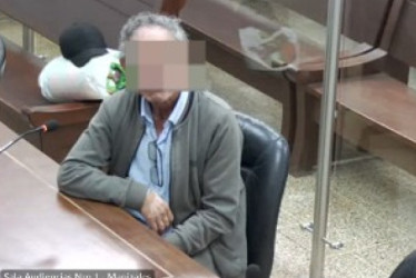 La persona detenida en el billar.